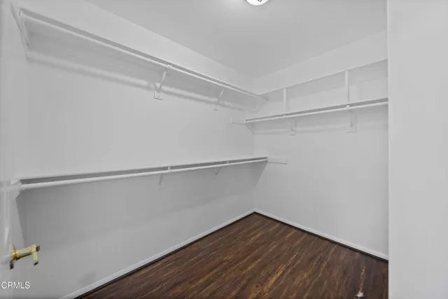 a view of an empty walk in closet