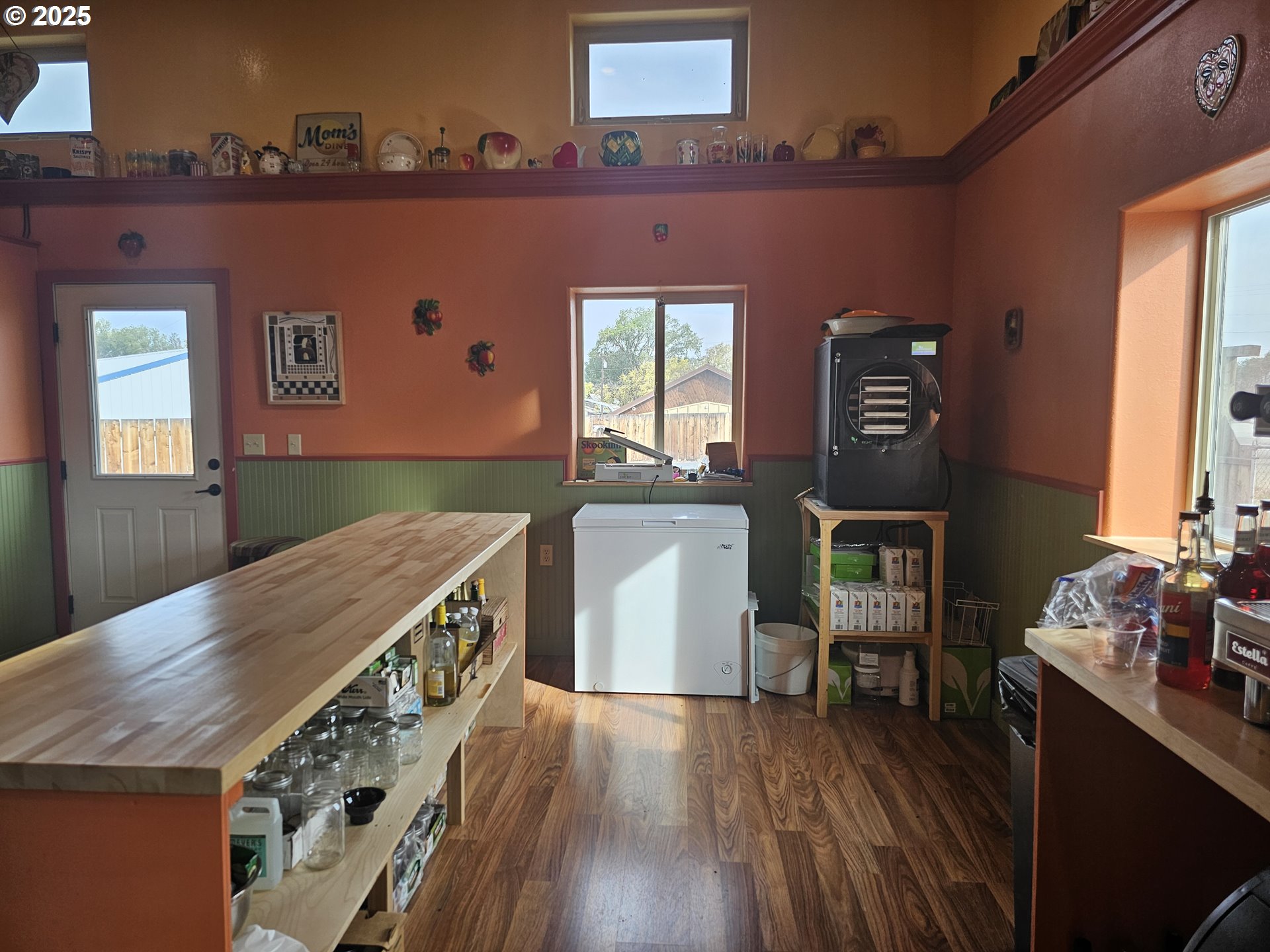 995 3rd Street North Powder, OR 97867 - Photo 15 of 28 a kitchen with a stove and a wooden floor
