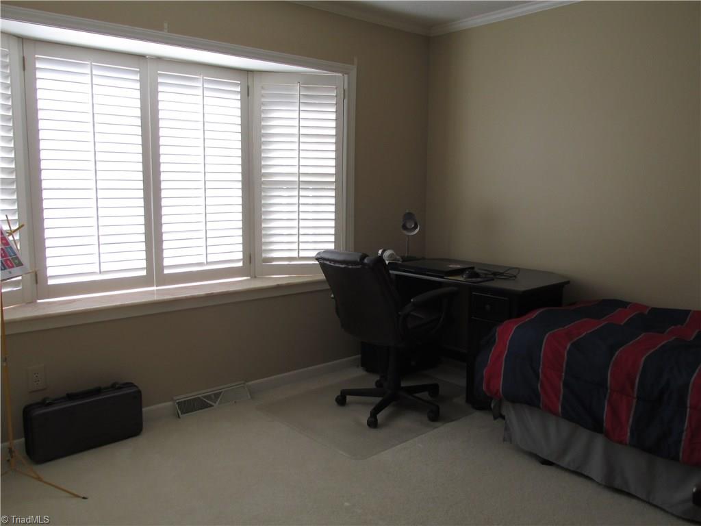 1108 Mapleview Court High Point, NC 27265 - Photo 15 of 17 Third bedroom or office. Notice the plantation shutters throughout the home.