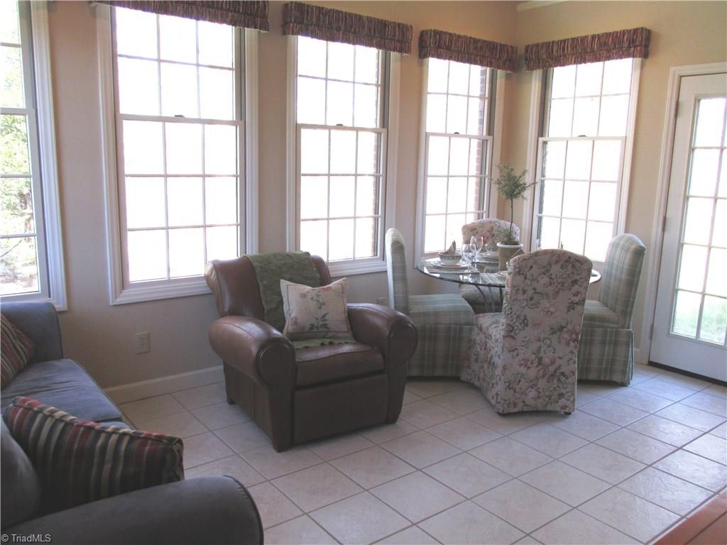 1108 Mapleview Court High Point, NC 27265 - Photo 6 of 17 The sun room is an added bonus!