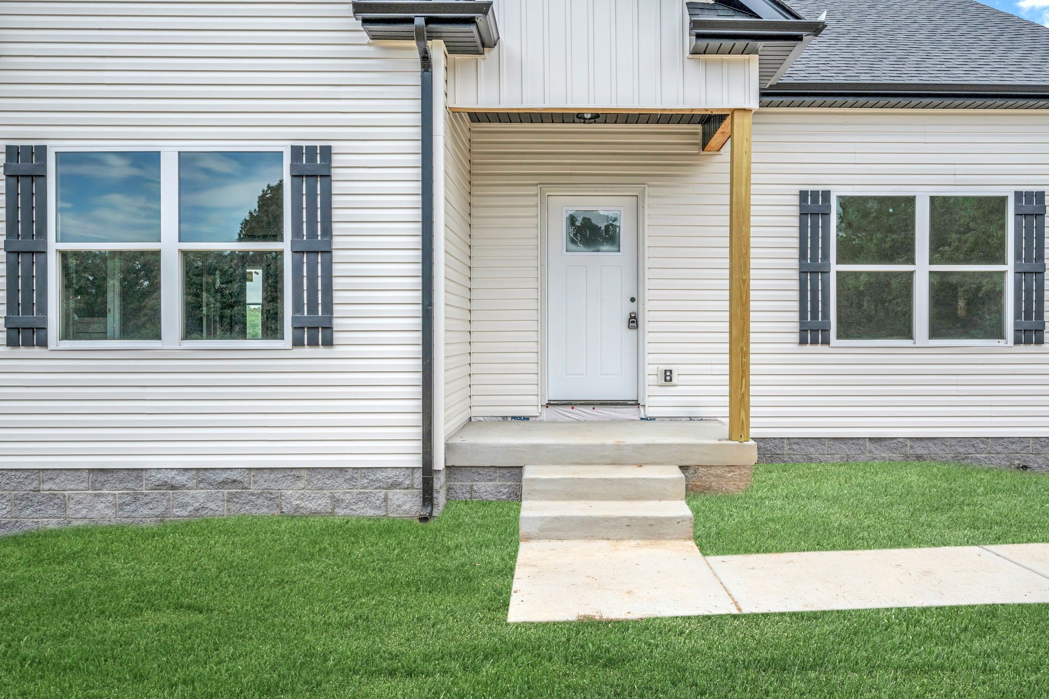878 Ford Road White Bluff, TN 37187 - Photo 29 of 34 Covered Front Entry + Concrete Sidewalk