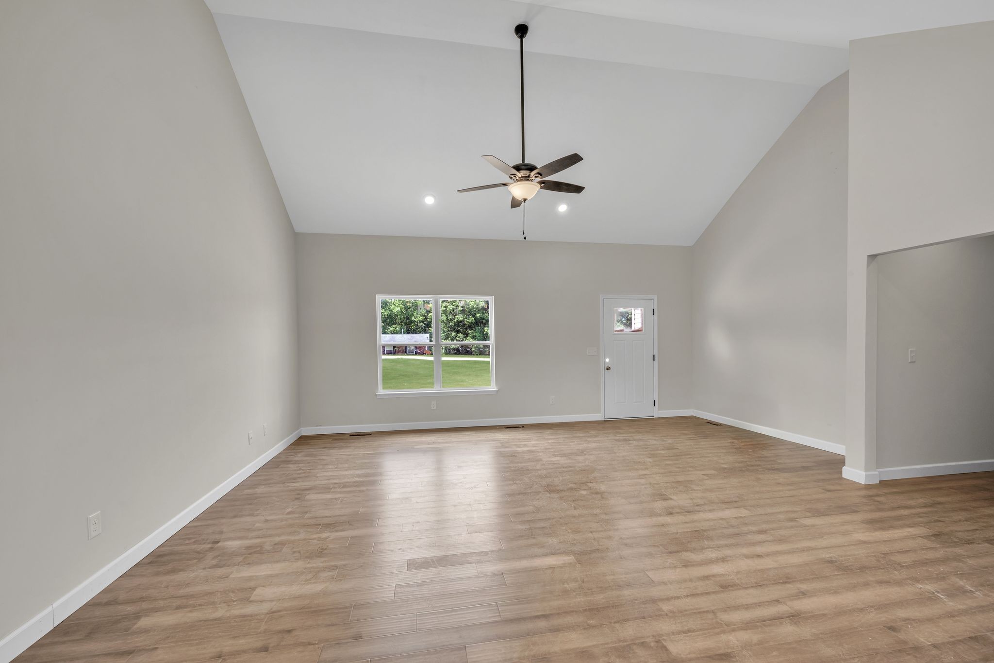 878 Ford Road White Bluff, TN 37187 - Photo 3 of 34 STATEMENT Making Great Room w/ Cathedral Ceiling + Wide Plank Floors