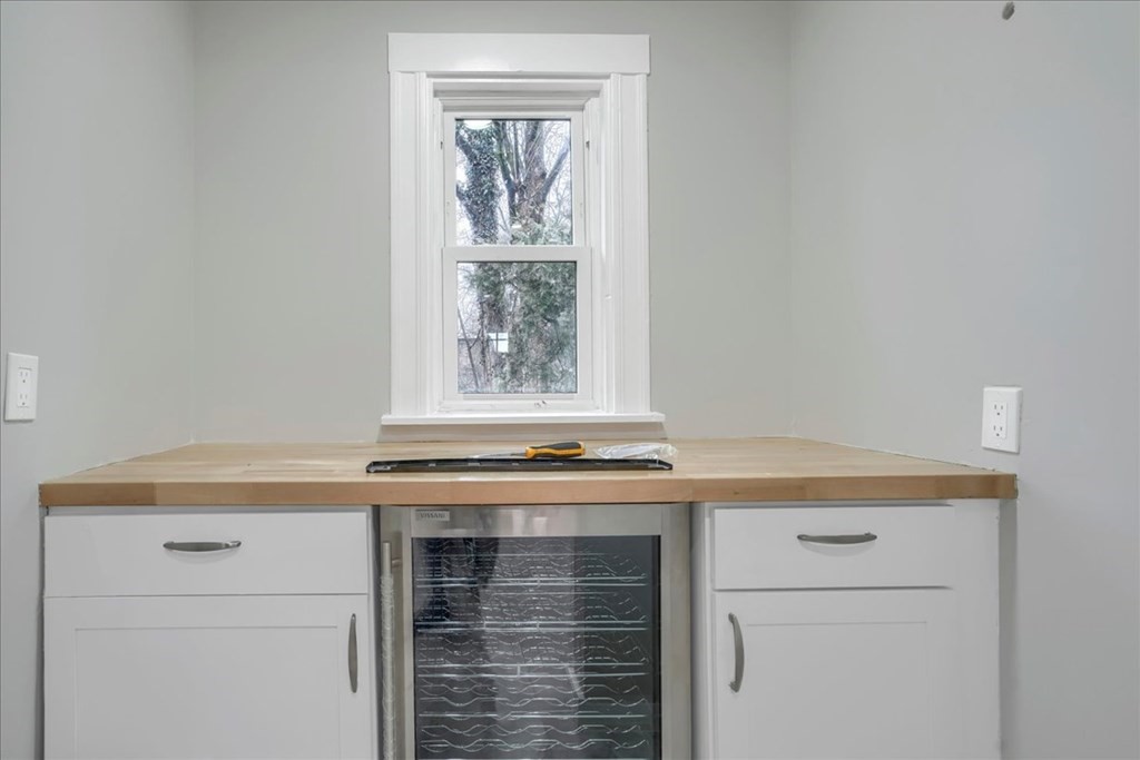 25 Patterson Street Boston, MA 02124 - Photo 15 of 32 a stove top oven sitting inside of a kitchen