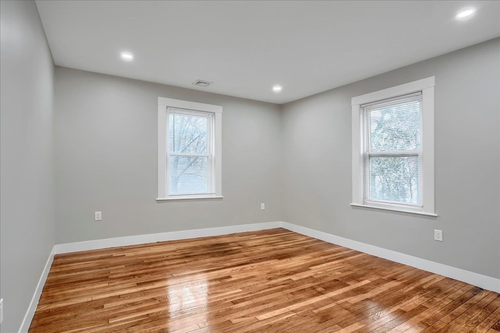 25 Patterson Street Boston, MA 02124 - Photo 21 of 32 a view of empty room with window