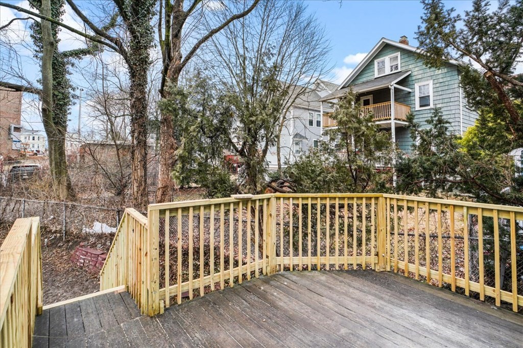 25 Patterson Street Boston, MA 02124 - Photo 29 of 32 a front view of a house with wooden fence