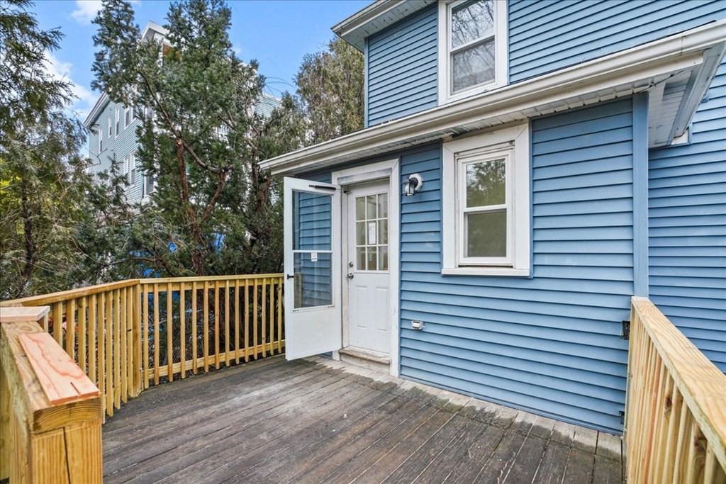 25 Patterson Street Boston, MA 02124 - Photo 30 of 32 a view of a house with a deck