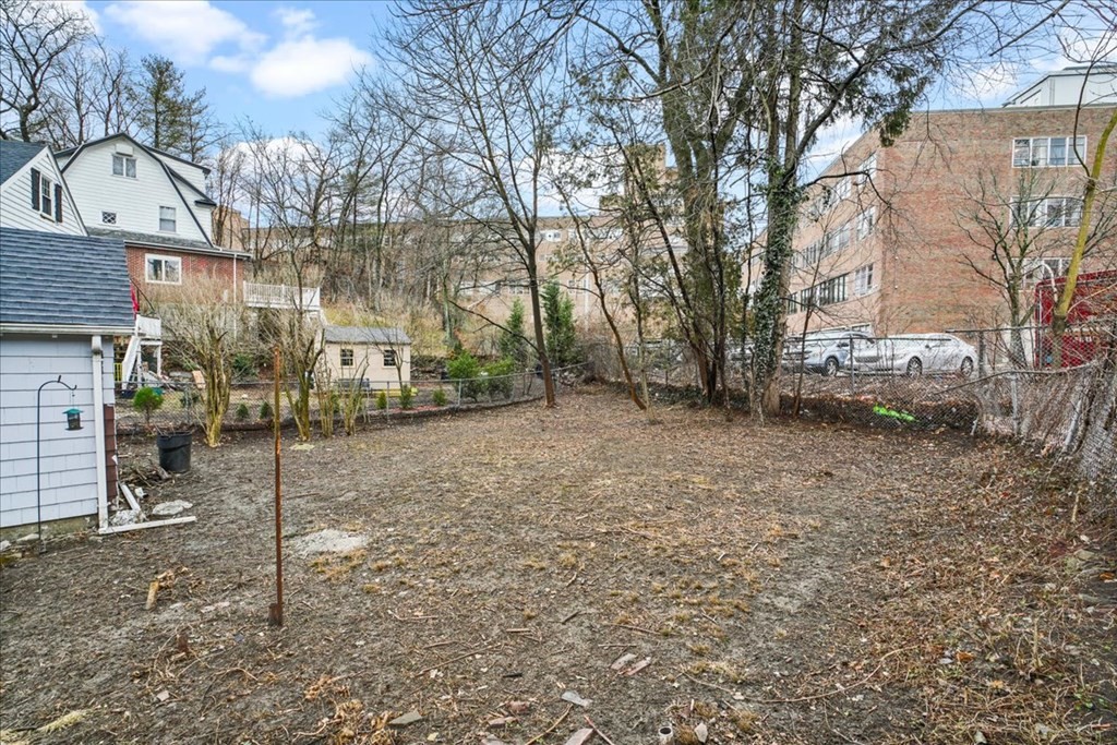 25 Patterson Street Boston, MA 02124 - Photo 31 of 32 a view of a house with a yard