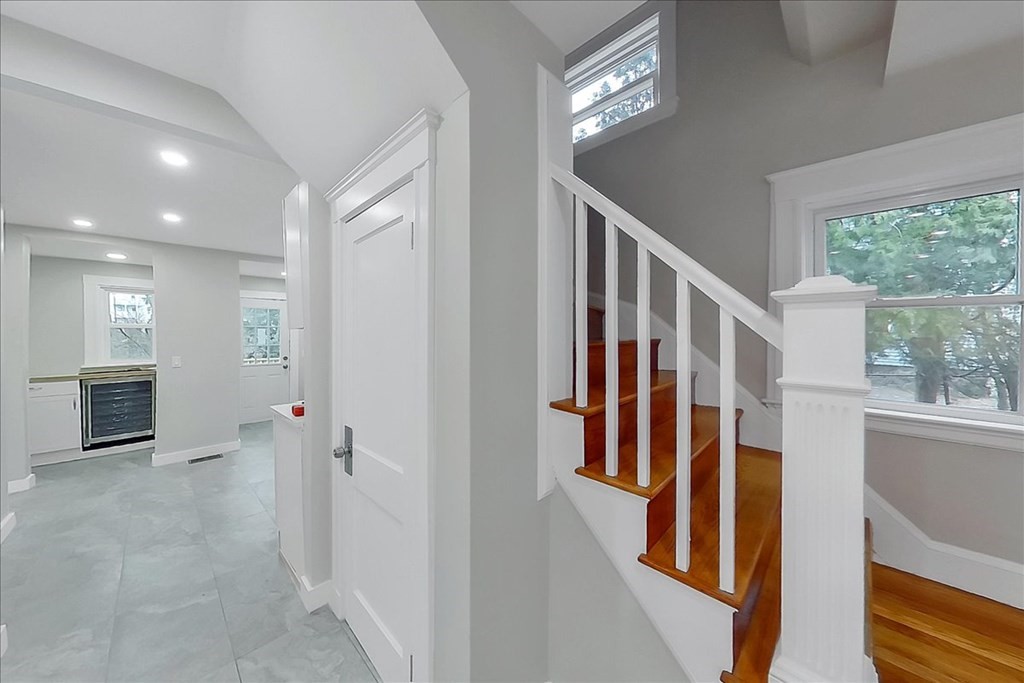 25 Patterson Street Boston, MA 02124 - Photo 4 of 32 a view of an entryway with wooden floor and windows