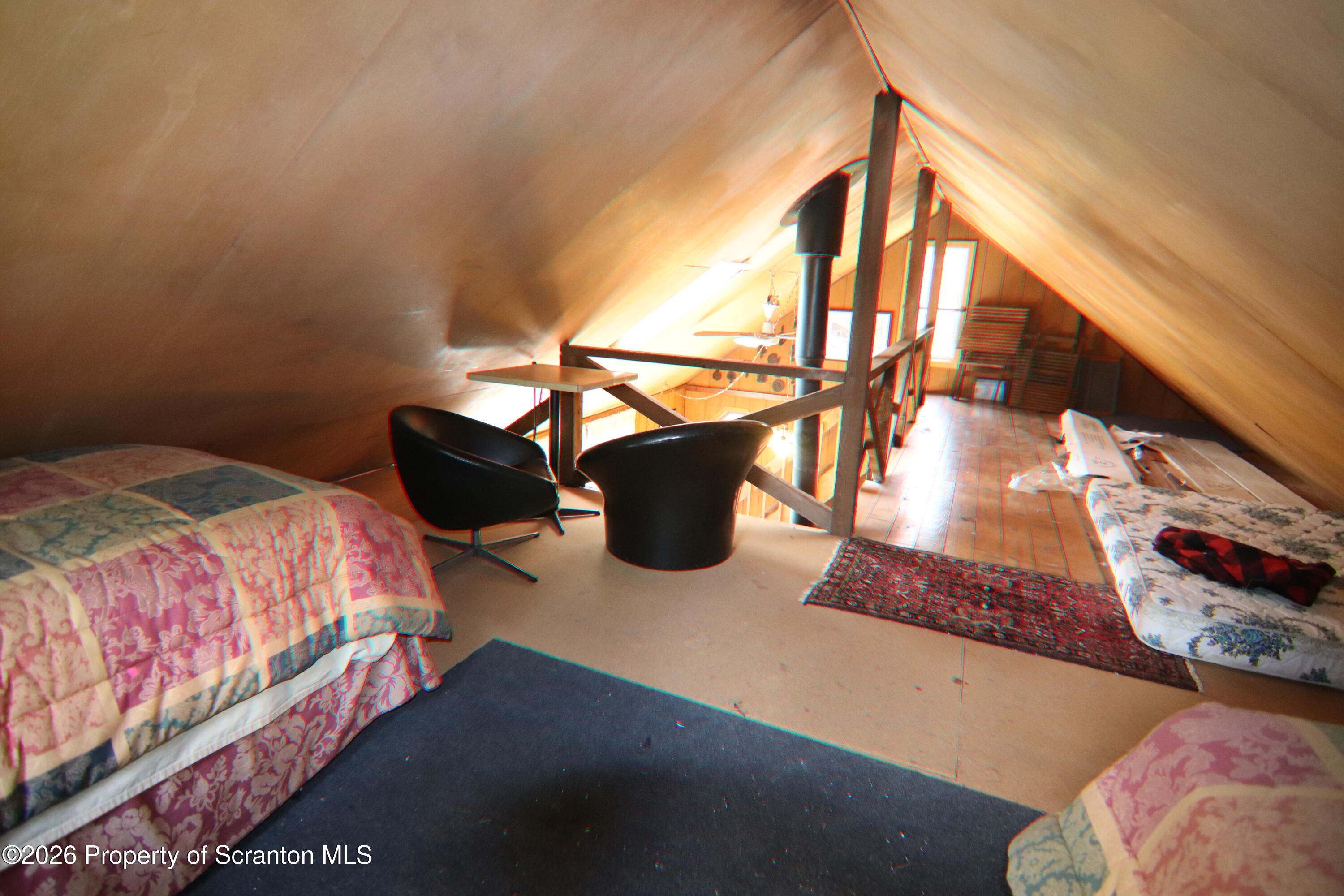 300 Pennsworth Hill Road Meshoppen, PA 18630 - Photo 25 of 38 a bedroom with a bed and window