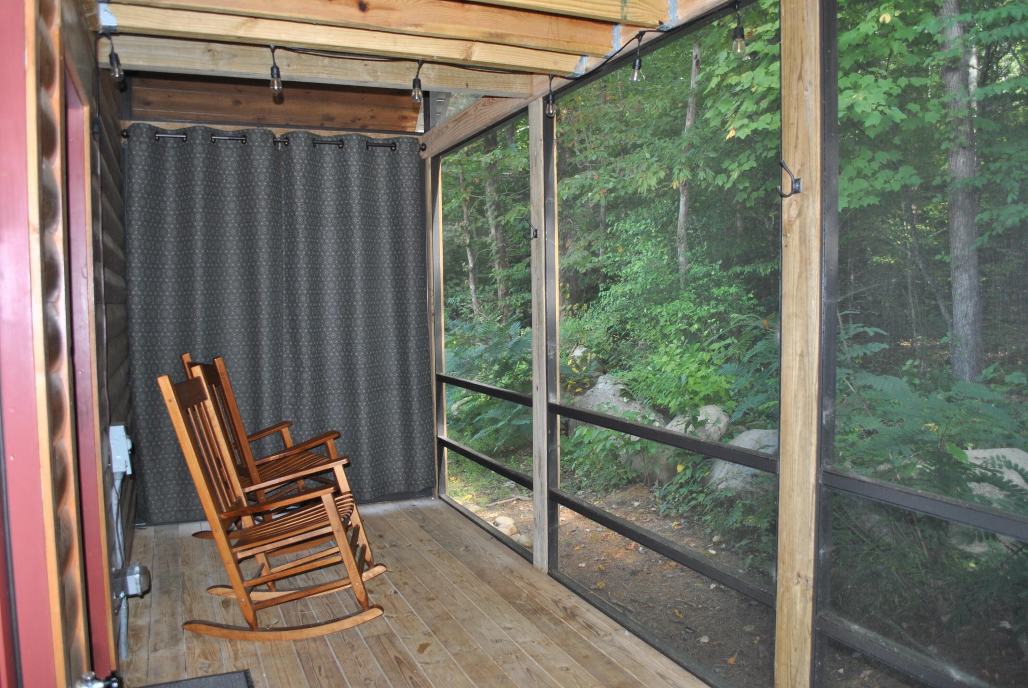 222 Forrest Loop Way Gatlinburg, TN 37738 - Photo 12 of 17 a view of a two chair in the balcony