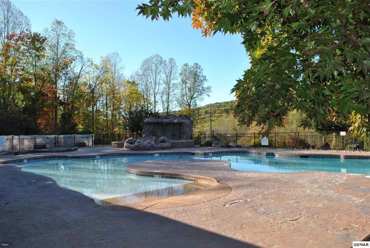 222 Forrest Loop Way Gatlinburg, TN 37738 - Photo 16 of 17 a view of a yard with large trees