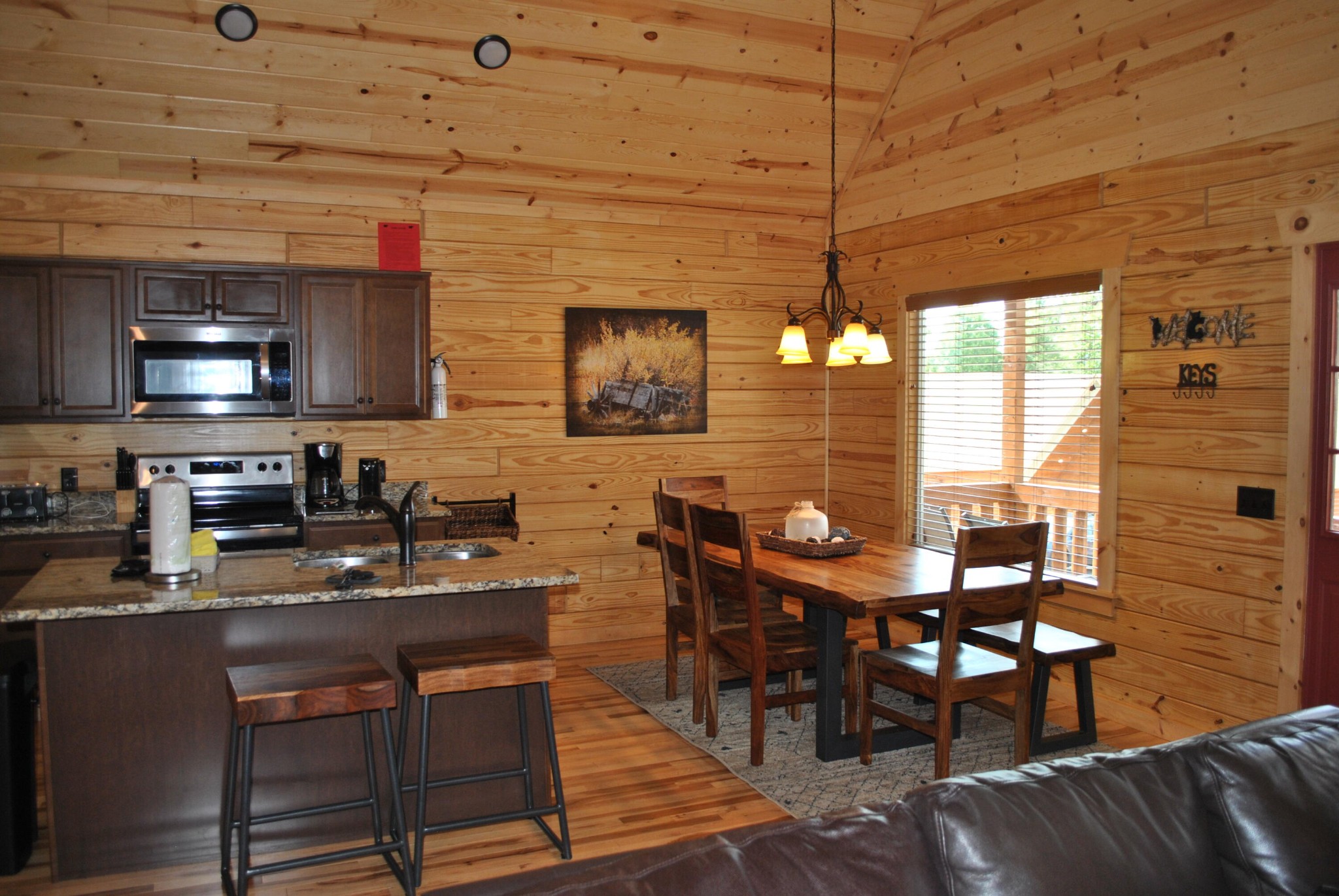 222 Forrest Loop Way Gatlinburg, TN 37738 - Photo 3 of 17 a group of chairs sitting in kitchen and dining room