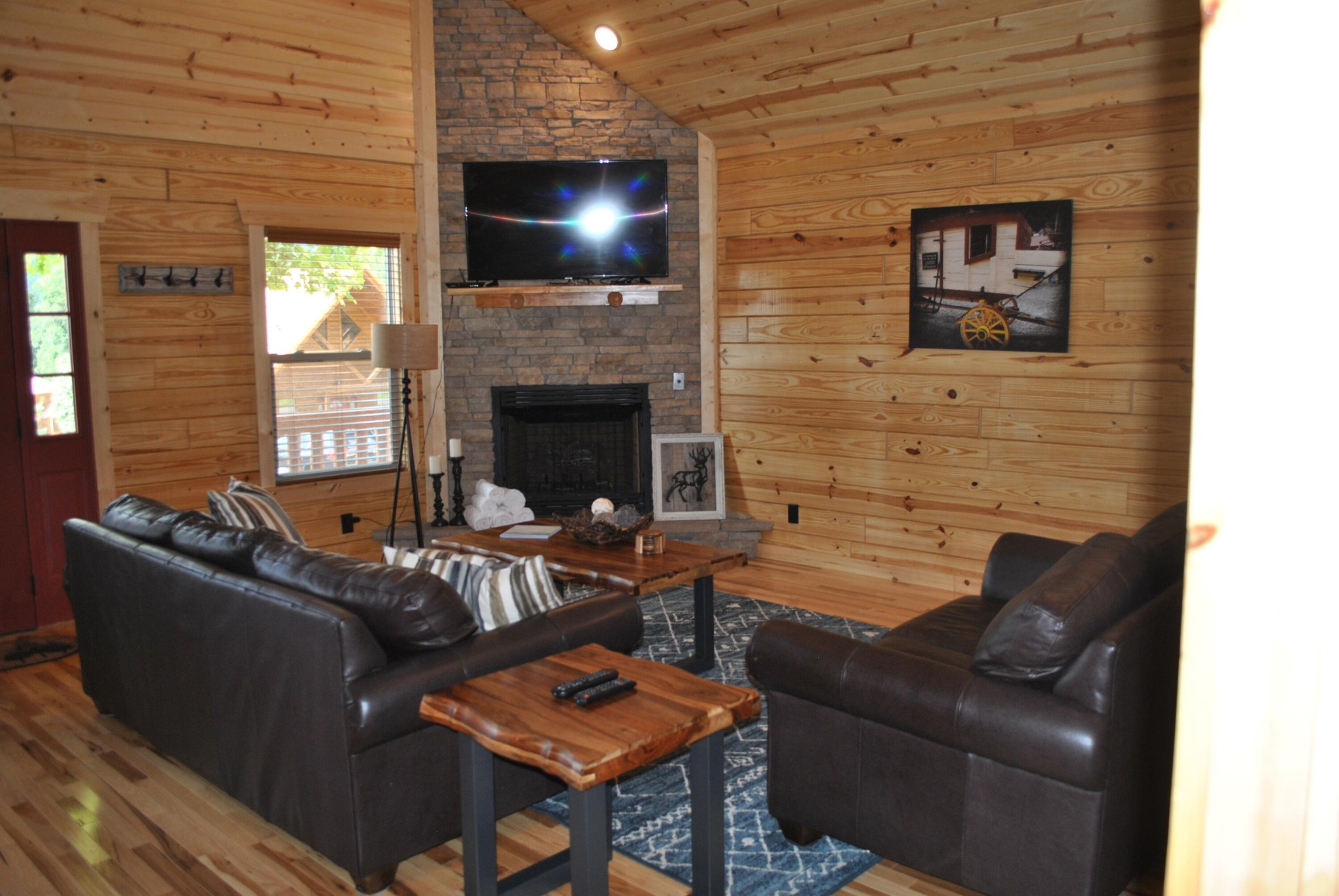 222 Forrest Loop Way Gatlinburg, TN 37738 - Photo 4 of 17 a living room with furniture and a fireplace