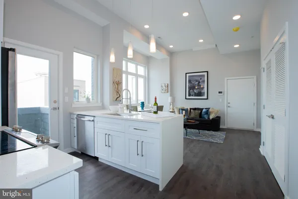 a bathroom with a double vanity sink and a bathtub