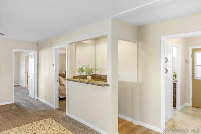 a view of a kitchen and a window