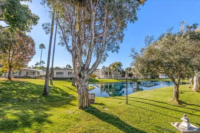 a view of a playground with basketball court