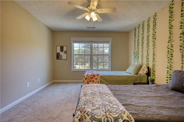 a utility room with a shower and a curtain