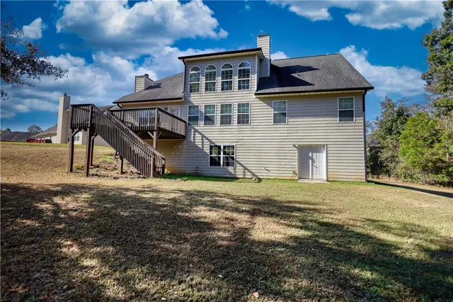 an aerial view of houses with yard