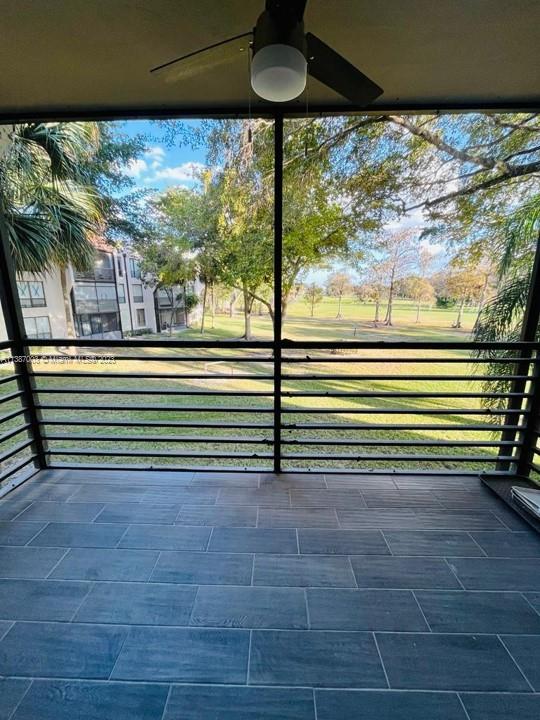 7950 West McNab Road, Unit 222 Tamarac, FL 33321 - Photo 16 of 35 a view of a room with furniture and a yard