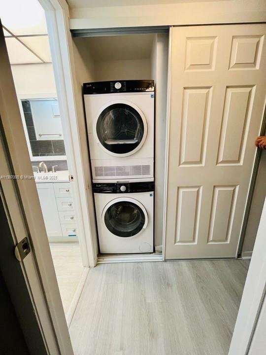 7950 West McNab Road, Unit 222 Tamarac, FL 33321 - Photo 27 of 35 a utility room with dryer and washer