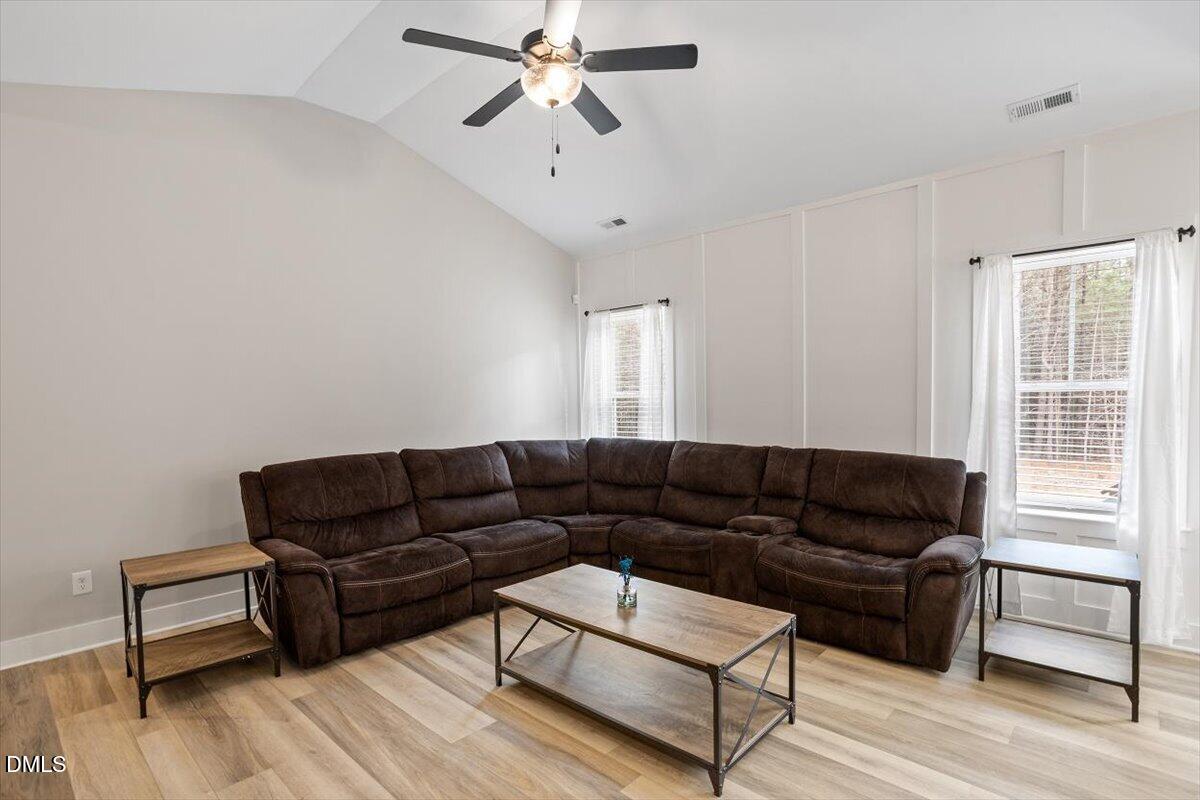 2810 Antioch Church Road Timberlake, NC 27583 - Photo 12 of 34 a living room with furniture and a window