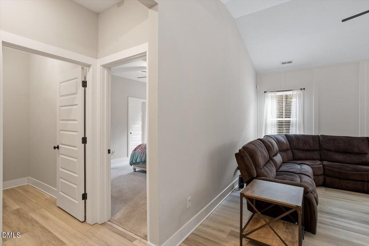 2810 Antioch Church Road Timberlake, NC 27583 - Photo 22 of 34 a living room with furniture and a window