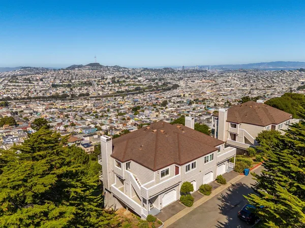 front view of a house with a small yard