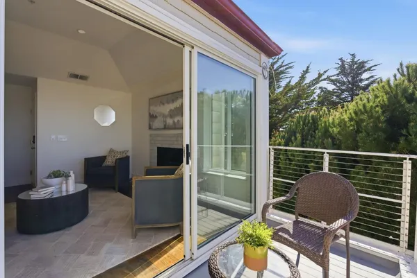 a kitchen with stainless steel appliances white cabinets and a sink