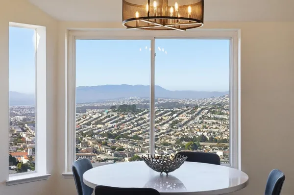 a bedroom with a bed and a dresser in it