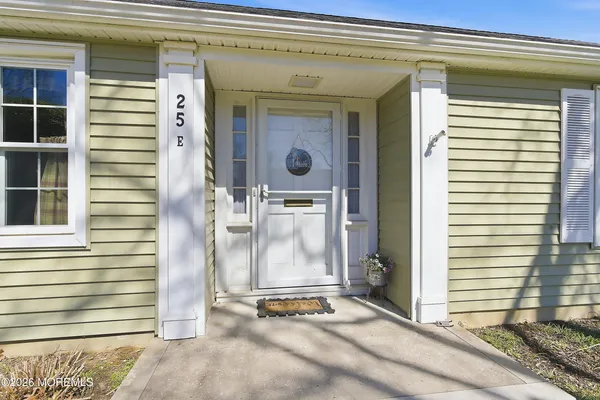 a view of entrance gate of a house