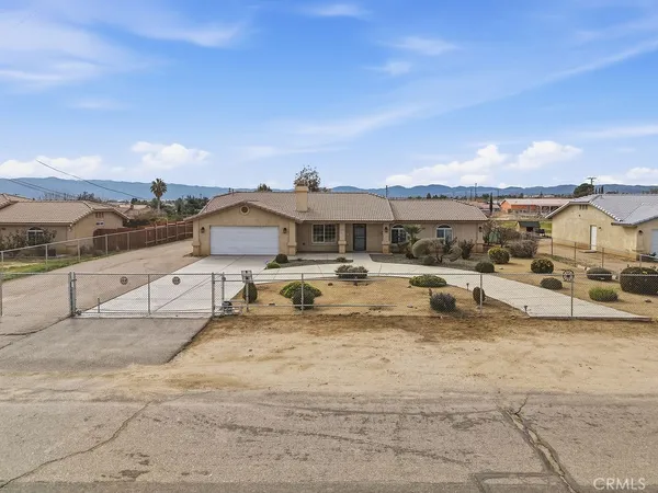 an aerial view of a house with a ocean view