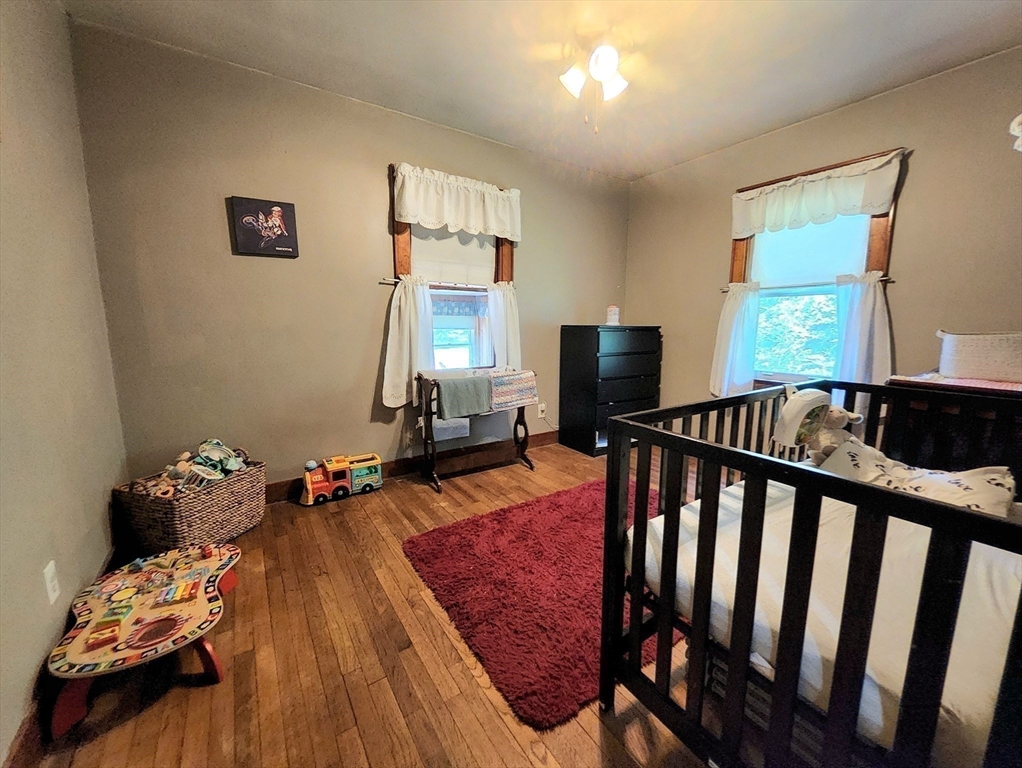323 New Boston Road Sturbridge, MA 01566 - Photo 17 of 37 a view of a livingroom with furniture and toys