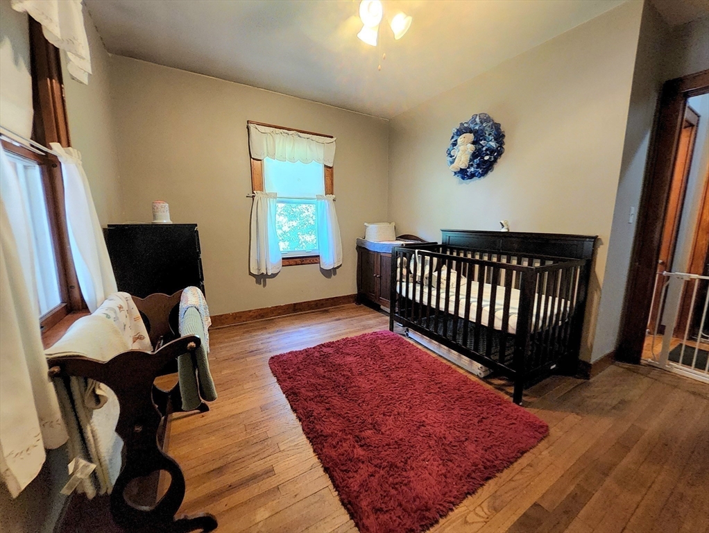 323 New Boston Road Sturbridge, MA 01566 - Photo 18 of 37 a bedroom with furniture and a window