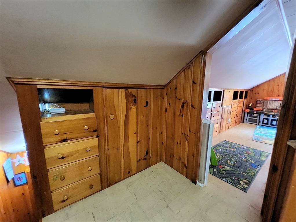 323 New Boston Road Sturbridge, MA 01566 - Photo 22 of 37 a view of walk in closet with clothes and shoes