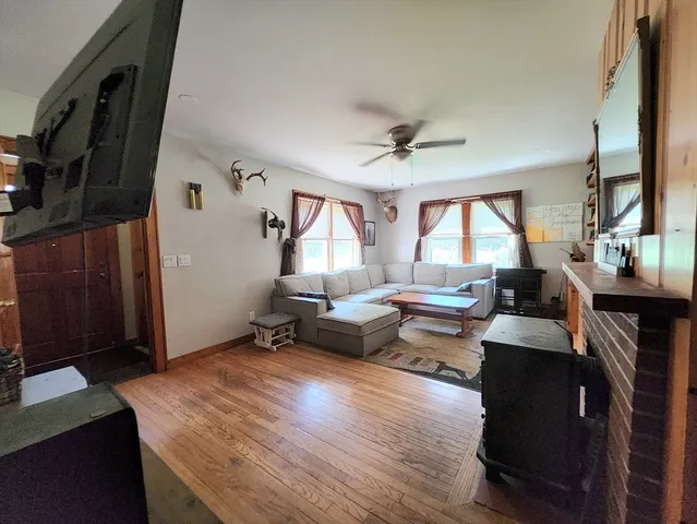 a kitchen with a refrigerator and a sink
