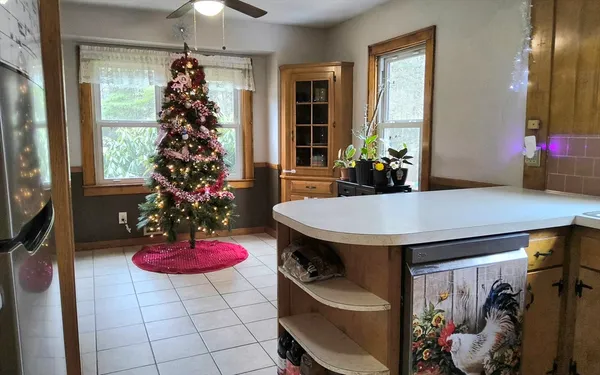 a bathroom with a sink a mirror and a shower