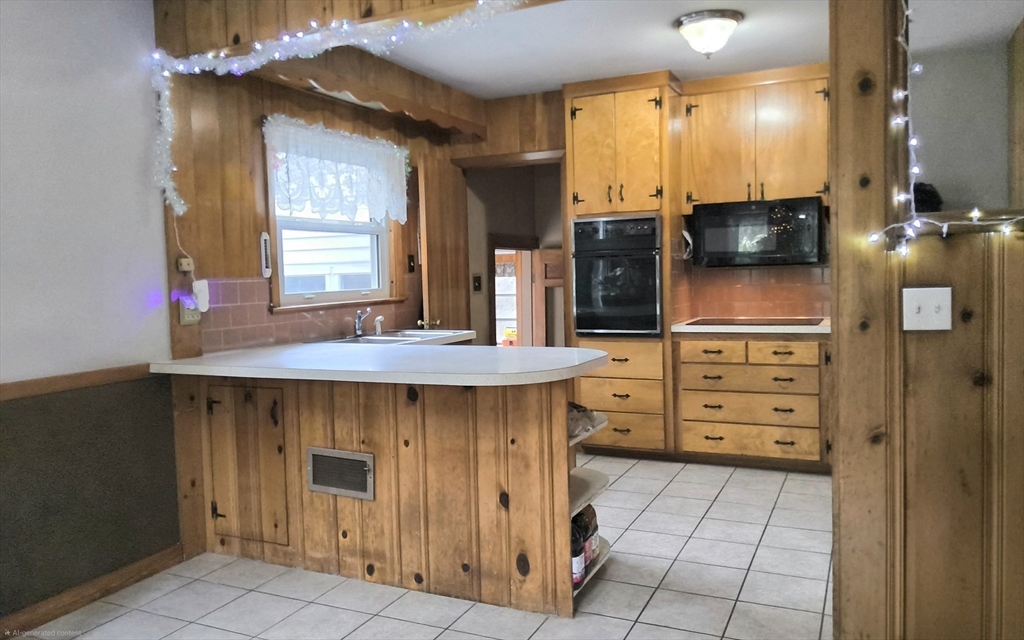 323 New Boston Road Sturbridge, MA 01566 - Photo 9 of 37 a kitchen with a sink and cabinets
