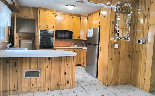 a room with furniture and a large window