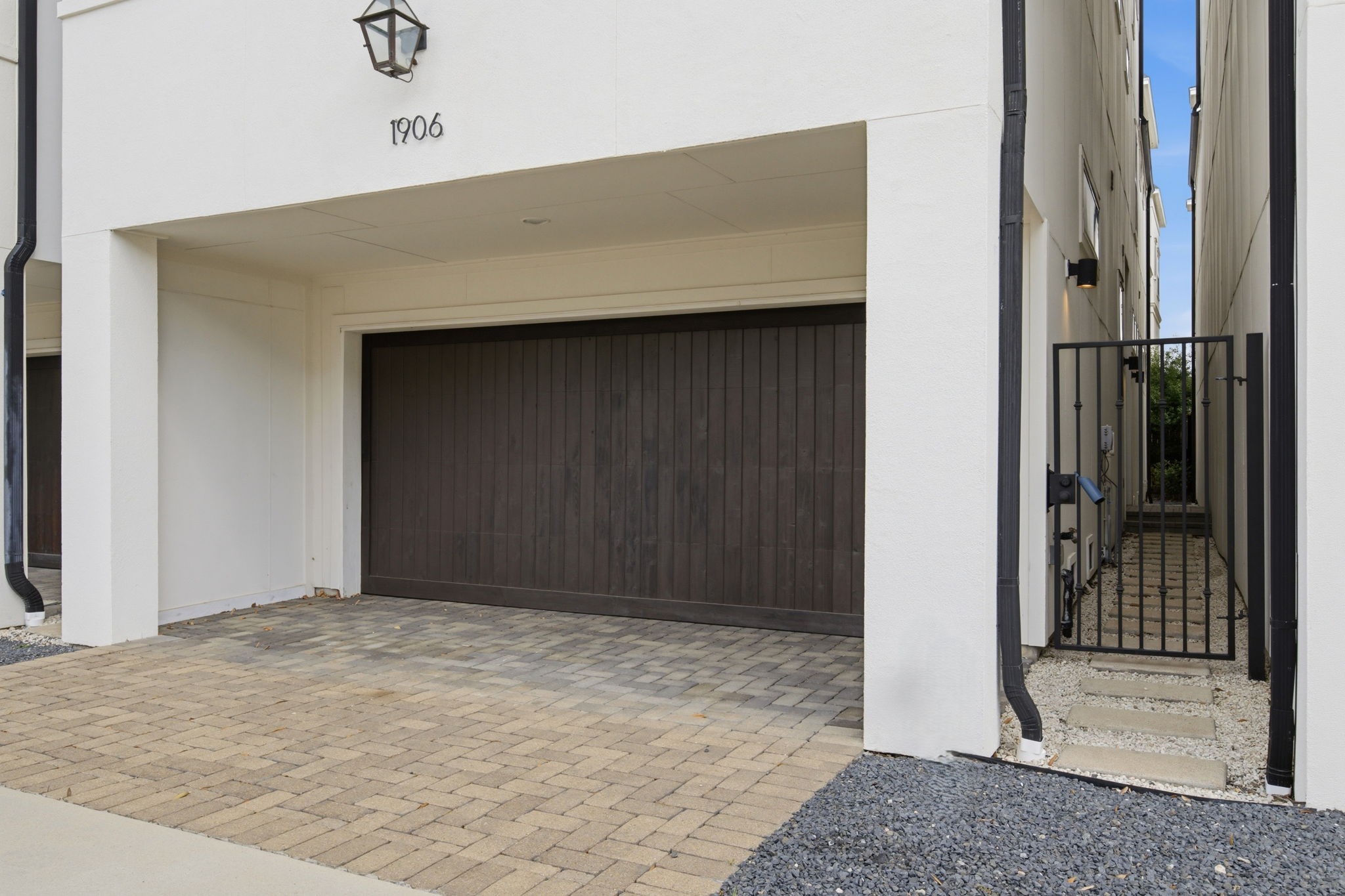 1906 West 25th Street Houston, TX 77008 - Photo 40 of 47 Covered area under the garage; gated entry to front door area
