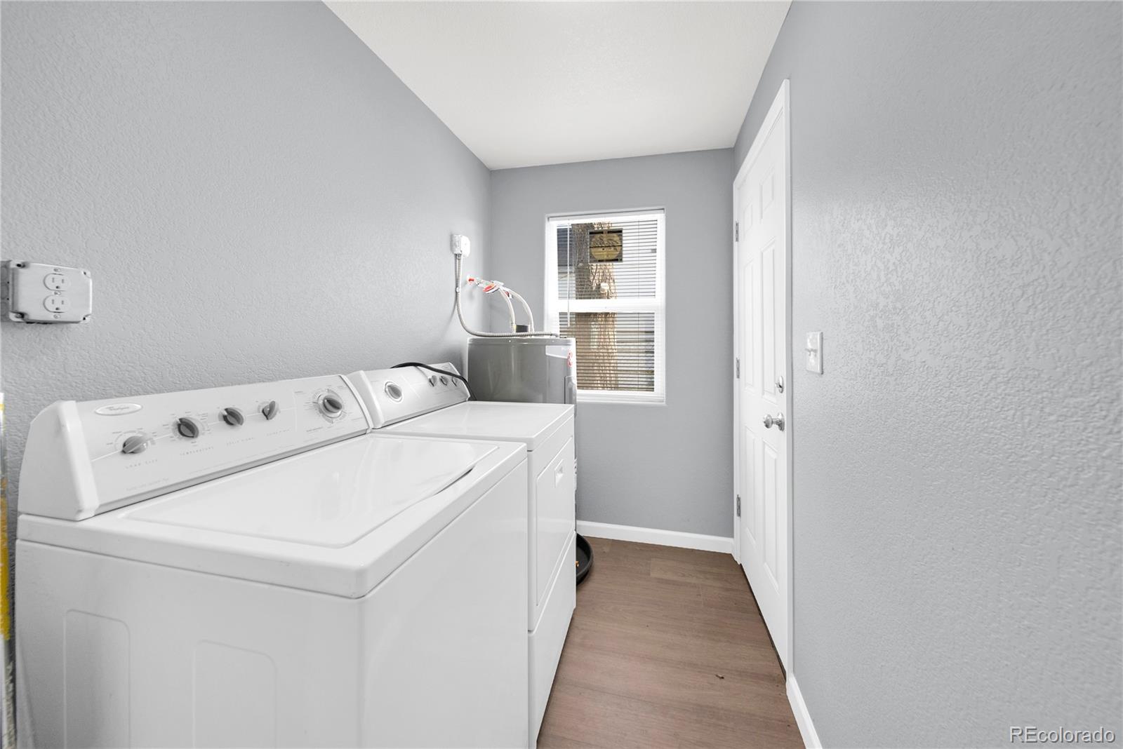 222 Platte Street Sterling, CO 80751 - Photo 14 of 24 a utility room with dryer and washer