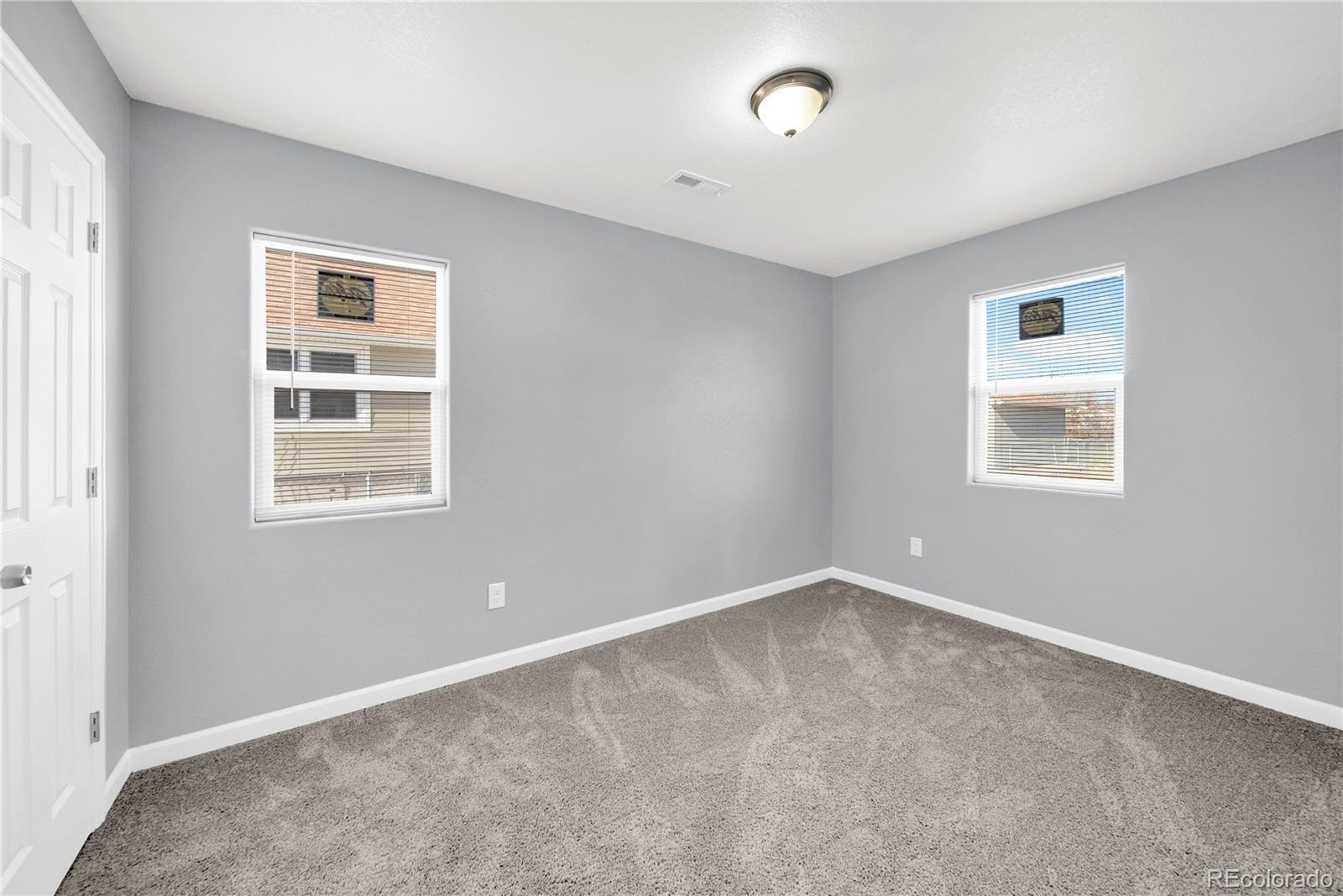 222 Platte Street Sterling, CO 80751 - Photo 15 of 24 a view of an empty room with a window