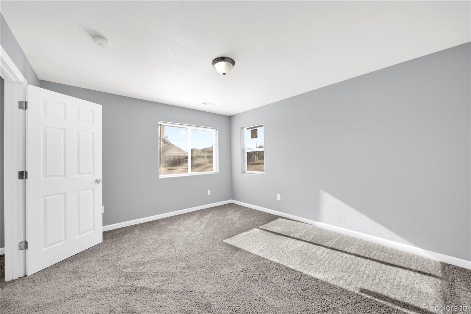 222 Platte Street Sterling, CO 80751 - Photo 16 of 24 an empty room with windows