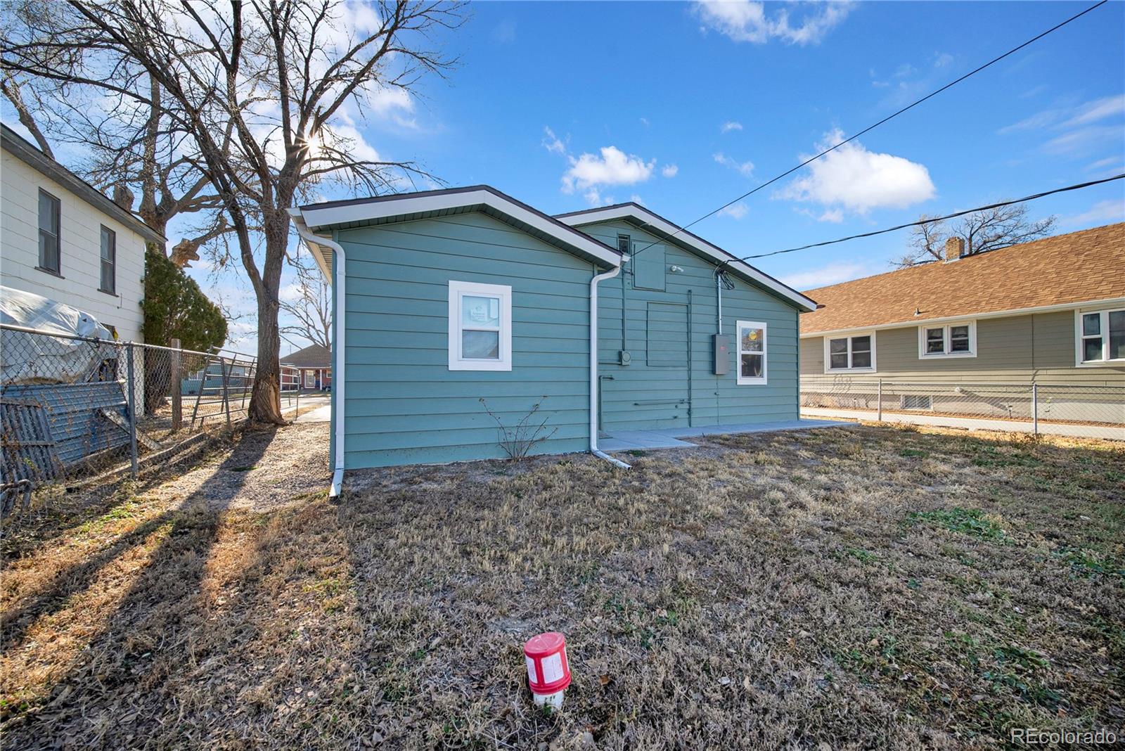 222 Platte Street Sterling, CO 80751 - Photo 17 of 24 a view of a house with a yard