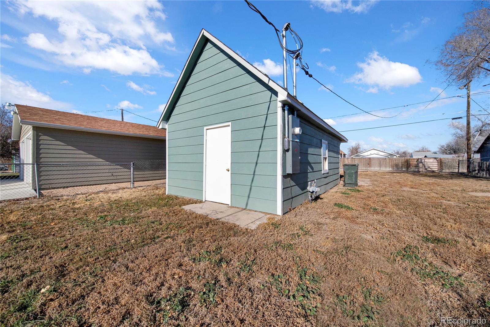 222 Platte Street Sterling, CO 80751 - Photo 20 of 24 a view of backyard of house