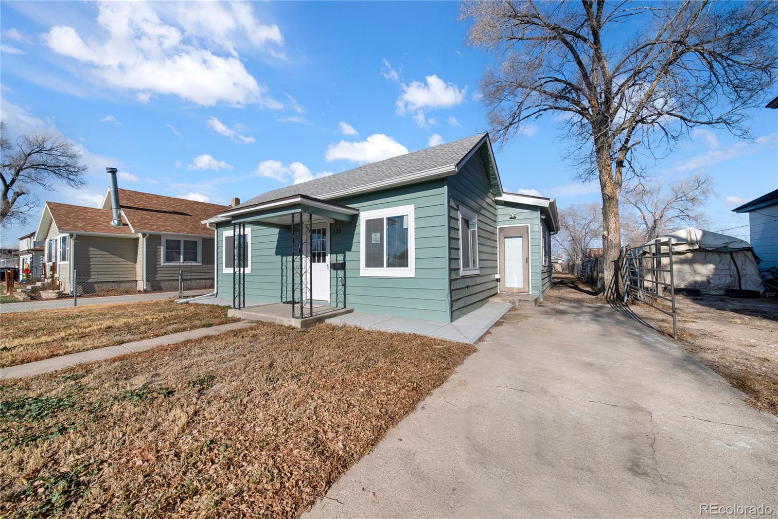 222 Platte Street Sterling, CO 80751 - Photo 3 of 24 a house view with a outdoor space