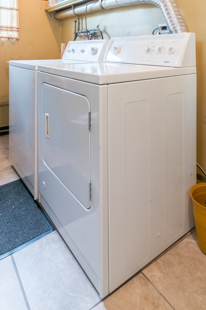 8518 East Prairie Road Skokie, IL 60076 - Photo 14 of 17 a utility room with dryer and washer