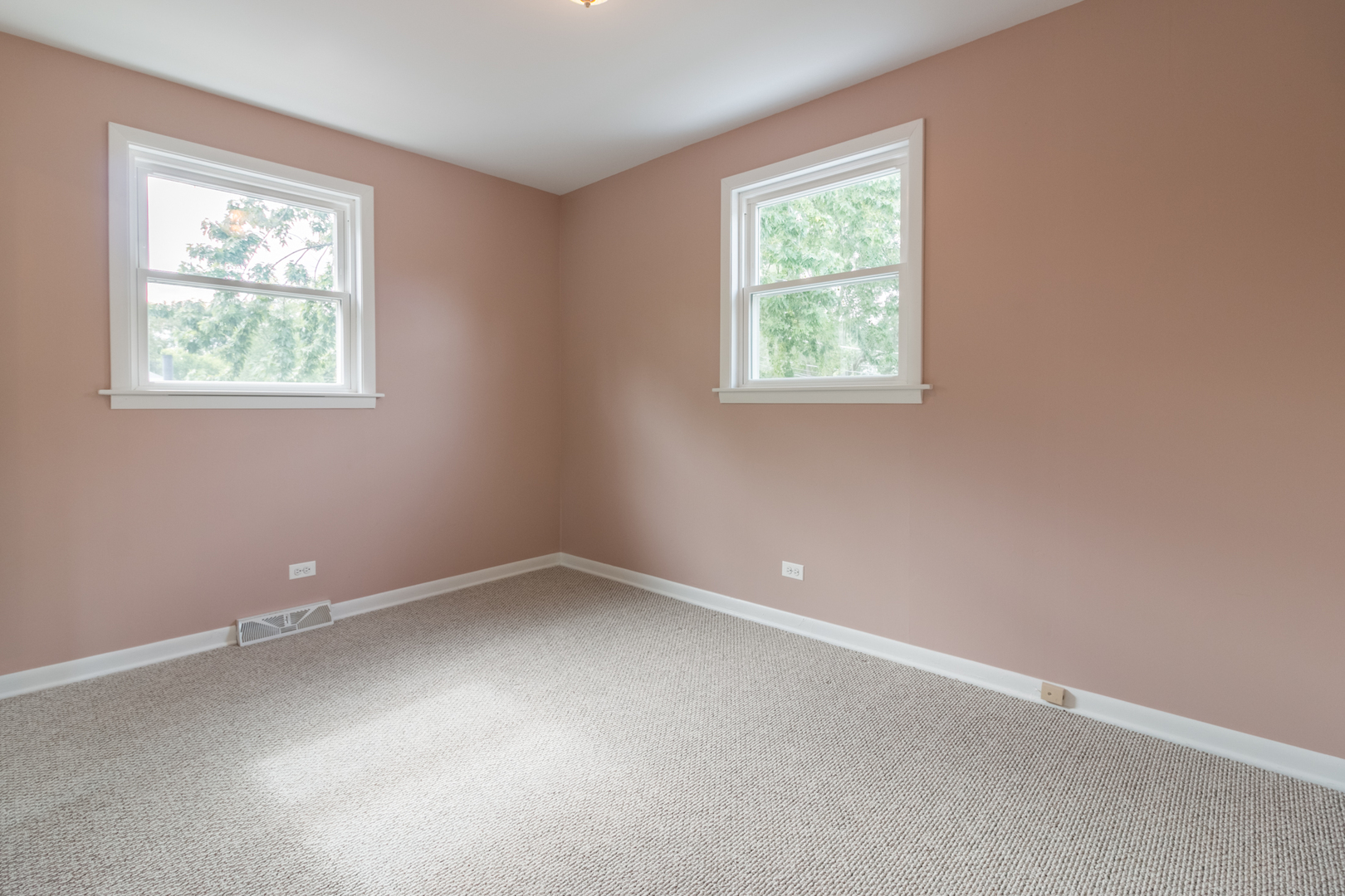 8518 East Prairie Road Skokie, IL 60076 - Photo 10 of 17 an empty room with a window