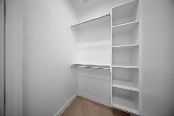 a view of staircase with railing and a stairs