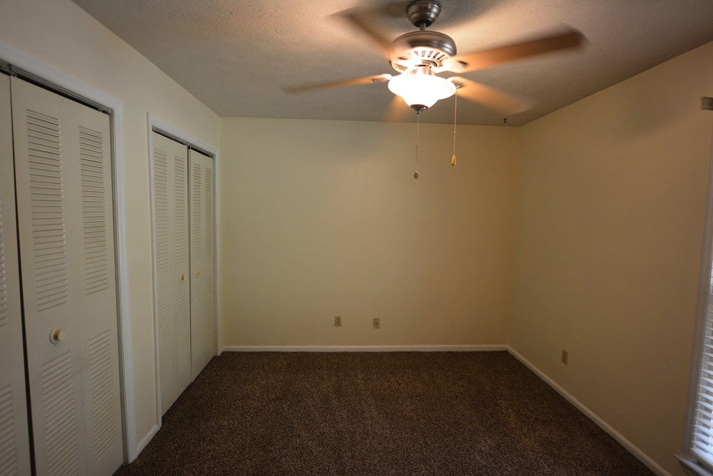 9 Lott Road Phenix City, AL 36869 - Photo 12 of 23 wooden floor in an empty room with a window