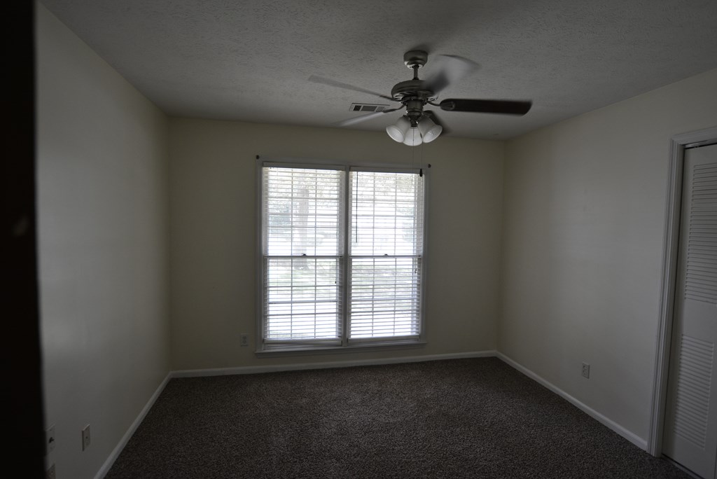 9 Lott Road Phenix City, AL 36869 - Photo 8 of 23 an empty room with a window